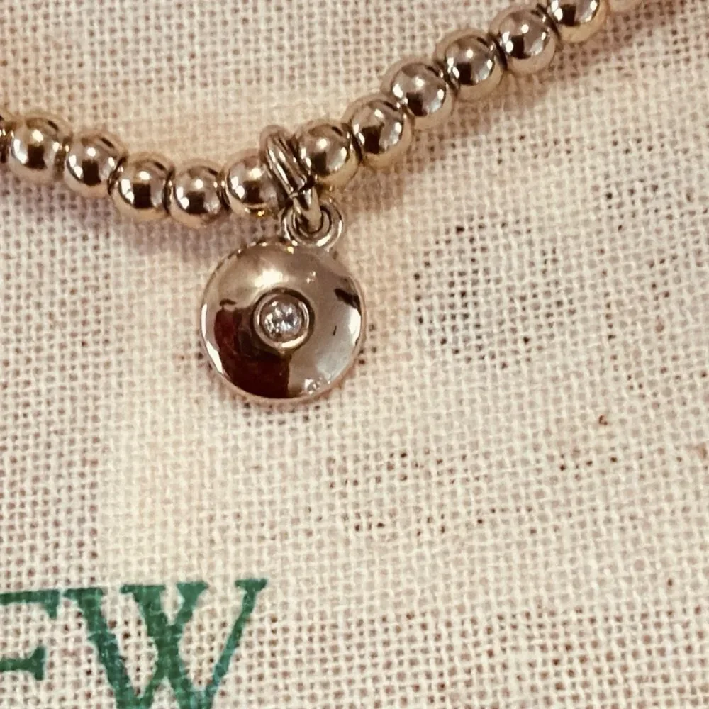 J.crew beaded stretch bracelet with dainty cubic zirconia charm